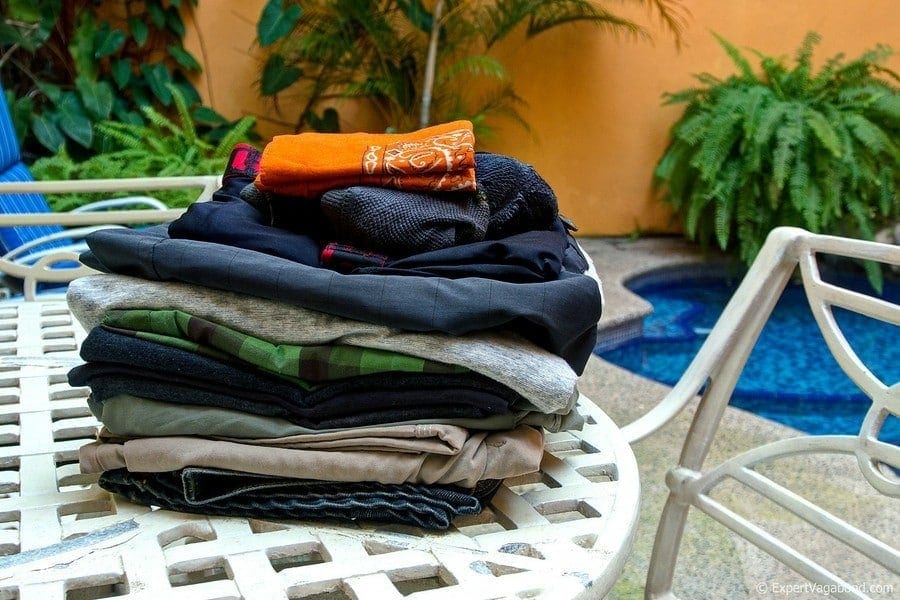 pile of clothes by pool