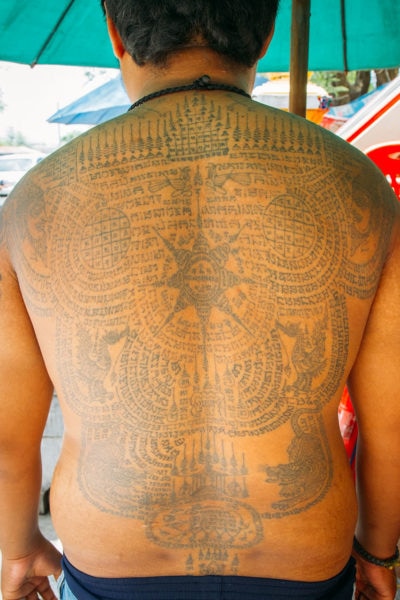 Man with Full Back Tattoo